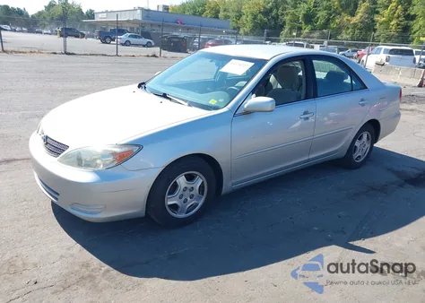 2003 Toyota Camry Le V6 z USA, uszkodzony, nr VIN 4T1BF32K23U567164